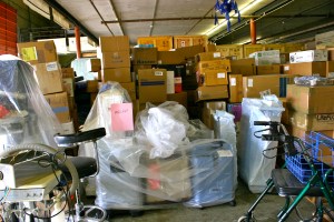 Donated equipment being loaded into Container